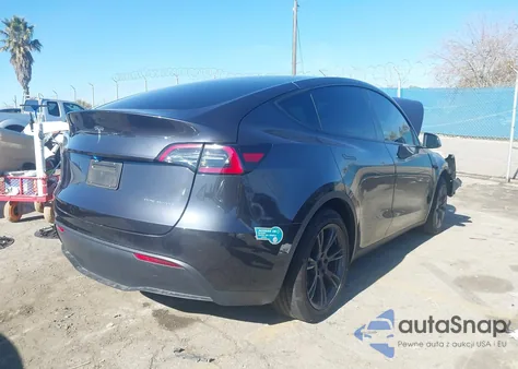 2025 Tesla Model Y Long Range Dual Motor All-Wheel Drive z USA, uszkodzony, nr VIN 7SAYGDEE2SF260465